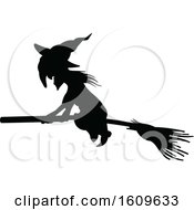 Clipart Of A Halloween Flying Witch Black And White Silhouette Royalty Free Vector Illustration