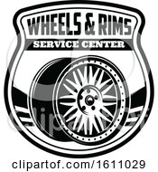 Clipart Of A Black And White Automotive Design With A Rim Royalty Free Vector Illustration