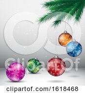 Tree Branch And Christmas Bauble Ornaments Over Gray