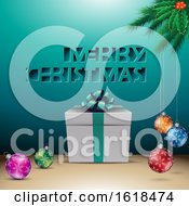 Merry Christmas Greeting With A Gift And Baubles Over Turquoise