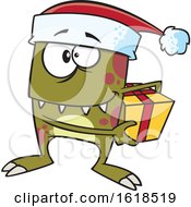 Cartoon Christmas Elf Monster Holding A Gift