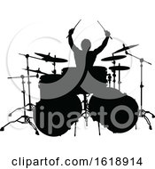 Silhouetted Male Drummer by AtStockIllustration