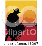 Poster, Art Print Of Lonely Cowboy Silhouetted At Sunset Sitting On A Fence And Holding A Rope While Watching The Sun Go Down