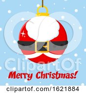 Closeup Of A Santa Christmas Suit Ornament Over Merry Christmas Text