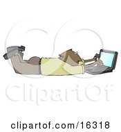 Poster, Art Print Of Balding African American Businessman In A Green Shirt And Slacks Lying On His Stomach While Typing On A Laptop Computer That Is Set On Wireless Internet