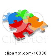 Four Different Colored Puzzle Pieces Connected Over A White Background Symbolizing Interlinking For Seo Website Marketing Teamwork And Diversity