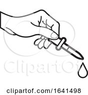 Black And White Hand Using A Dropper by Lal Perera