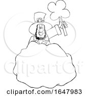 Poster, Art Print Of Cartoon Black And White St Patricks Day Leprechaun Holding Up A Shamrock Behind A Rock