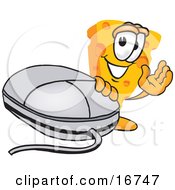 Clipart Picture Of A Wedge Of Orange Swiss Cheese Mascot Cartoon Character Waving And Standing By A Computer Mouse