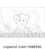 Puppy Sitting On Grass Next To A Ball And Pinwheel by Alex Bannykh