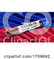 Flag Of Haiti Waving In The Wind With A Positive Covid 19 Blood Test Tube