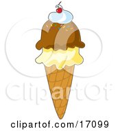 Waffle Cone With Vanilla And Chocolate Ice Cream And Topped With Whipped Cream And A Cherry