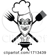 African Mask With Crossed Fork And Spatula Over Bbq