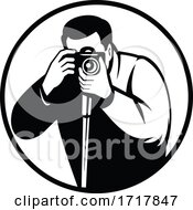 Photographer Shooting With Digital SLR Camera Retro Black And White by patrimonio