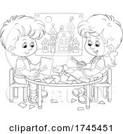 Boy And Girl Making Paper Crafts