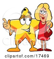 Star Mascot Cartoon Character Talking To A Pretty Blond Woman by Mascot Junction