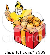 Poster, Art Print Of Star Mascot Cartoon Character Standing By A Christmas Present