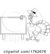 Black And White Thanksgiving Turkey Mascot With A Blank Sign