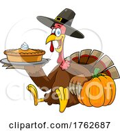 Thanksgiving Turkey Mascot Holding A Pumpkin Pie
