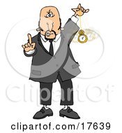 Bald Middle Aged Caucasian Man In A Suit Holding One Finger Up And Swinging A Pocket Watch While Hypnotizing And Putting The Viewer Into A Trance