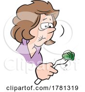 Cartoon Woman Holding A Brussel Sprout On A Fork And Looking Grossed Out