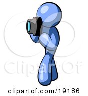 Blue Man Character Tourist Or Photographer Taking Pictures With A Camera by Leo Blanchette