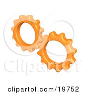Pair Of Orange Cogs Turning Gears Together
