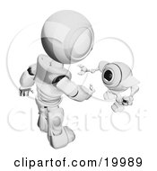 Poster, Art Print Of Short Metallic Spybot Webcam Looking Up And Talking With A Humanoid Robot On A White Background