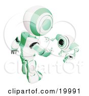 Poster, Art Print Of Short Green And White Spybot Webcam Looking Up And Talking With A Humanoid Robot On A White Background