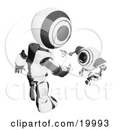 Poster, Art Print Of Short Black And White Spybot Webcam Looking Up And Talking With A Humanoid Robot On A White Background