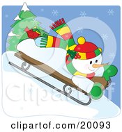 Happy Snowman In A Colorful Hat And Scarf Riding Downhill On A Sled On A Snowy Winter Day With A Red Cardinal Bird On His Foot by Maria Bell