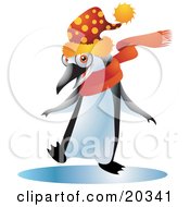 Happy Black And White Penguin Bird In A Spotted Wintry Hat And An Orange Scarf Dancing On A Frozen Body Of Water