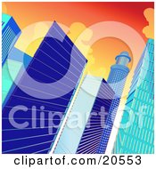 Poster, Art Print Of Blue Highrise Glass Buildings Towering Against A Sunset Sky In A City