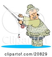 Happy Man Dressed In Camouflage Gear Wading In Water And Holding His Fishing Pool While Smiling