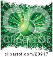 Poster, Art Print Of Sparkling Green Glass Christmas Ornament Bauble Over A Bursting Green Background