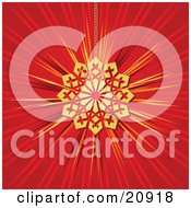 Clipart Illustration Of A Shiny Golden Snowflake Christmas Tree Ornament Suspended By A Chain Over A Red Background by elaineitalia