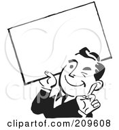 Retro Black And White Businessman Winking And Holding A Blank Sign