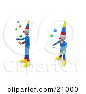 Two Performing Circus Clowns Entertaining The Crowd By Juggling Balls
