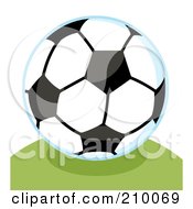 Poster, Art Print Of Soccer Ball With A Blue Outline On A Grassy Hill