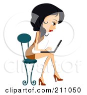 Beautiful Black Haired Woman Sitting In A Chair And Using A Laptop