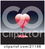 Poster, Art Print Of Bleeding Red Heart Dripping On A Black Surface Over A Gradient Gray Background