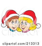 Happy Christmas Boy And Girl Wearing Santa Hats