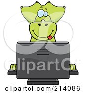 Big Green Dino Smiling And Using A Computer