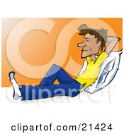 Poster, Art Print Of Happy Man In Casual Clothes Resting His Back Against A Pillow And Holding His Arm Up Behind His Head And Smiling While Relaxing