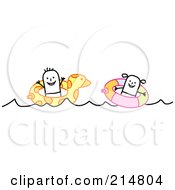 Two Children Swimming With Inner Tubes