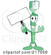 Green Toothbrush Character Mascot Holding A Small Blank Sign