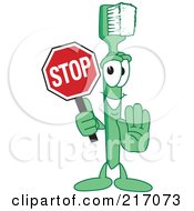 Royalty Free RF Clipart Illustration Of A Green Toothbrush Character Mascot Holding A Stop Sign by Mascot Junction