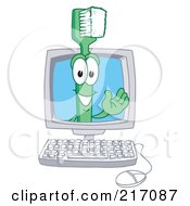 Green Toothbrush Character Mascot In A Computer