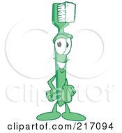 Royalty Free RF Clipart Illustration Of A Green Toothbrush Character Mascot Pointing Outwards by Mascot Junction