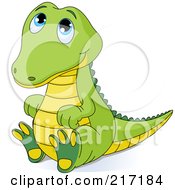 Poster, Art Print Of Cute Baby Crocodile Sitting And Looking Up
